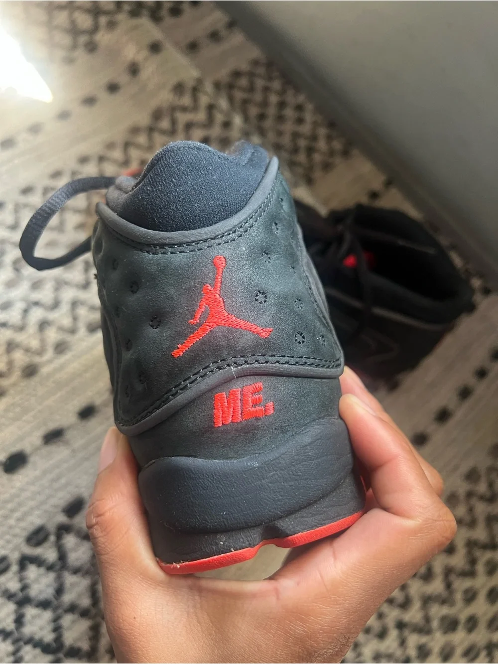 Melody Ehsani Jordan Black and Red High-Top Sneakers